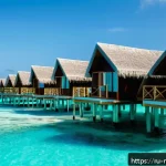 몰디브 환경 보호 캠페인 - A serene eco-friendly Maldivian resort featuring overwater bungalows with solar panels on the roofs,...